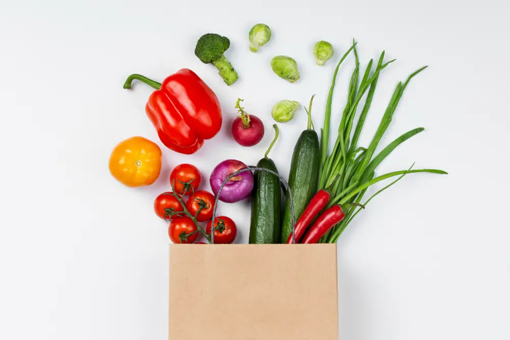 Garden Vegetables Safe for Dogs - a paper bag with vegetables
